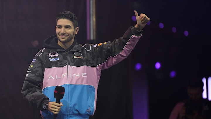 Nov 17, 2023; Las Vegas, Nevada, USA;  BWT Alpine F1 driver Esteban Ocon (31) of France greets fans during opening interviews prior to practice 3 at the Las Vegas Strip Circuit. Mandatory Credit: Lucas Peltier-Imagn Images