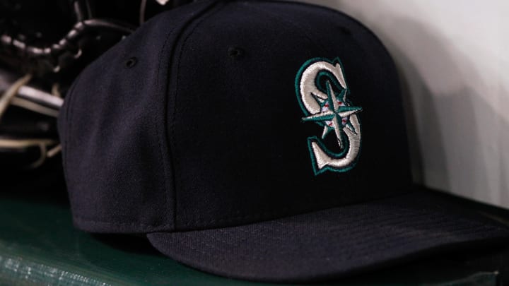 A Seattle Mariners hat is pictured in the dugout in a game against the Tampa Bay Rays in 2013 at Tropicana Field.