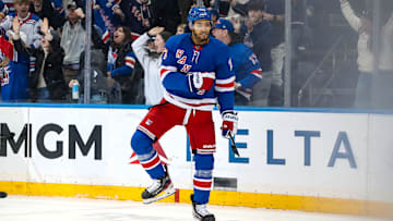 Mar 22, 2025; New York, New York, USA; New York Rangers defenseman K'Andre Miller (79) celebrates his goal against the Vancouver Canucks during the third period at Madison Square Garden.