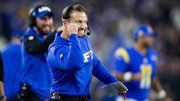 Jan 13, 2025; Glendale, AZ, USA; Los Angeles Rams head coach Sean McVay celebrates a touchdown against the Minnesota Vikings during an NFC wild card game at State Farm Stadium.
