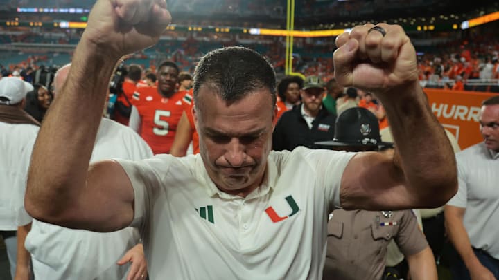 Aug 31, 2025; Miami Gardens, Florida, USA; Miami Hurricanes head coach Mario Cristobal reacts after defeating the Notre Dame Fighting Irish at Hard Rock Stadium. Mandatory Credit: Sam Navarro-Imagn Images