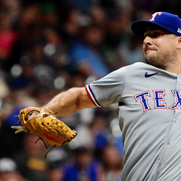 Jun 25, 2024; Milwaukee, Wisconsin, USA; Texas Rangers relief pitcher Brock Burke (46) pitches against the Milwaukee Brewers in the sixth inning at American Family Field. 