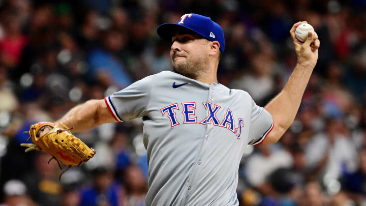 Jun 25, 2024; Milwaukee, Wisconsin, USA; Texas Rangers relief pitcher Brock Burke (46) pitches against the Milwaukee Brewers in the sixth inning at American Family Field. 