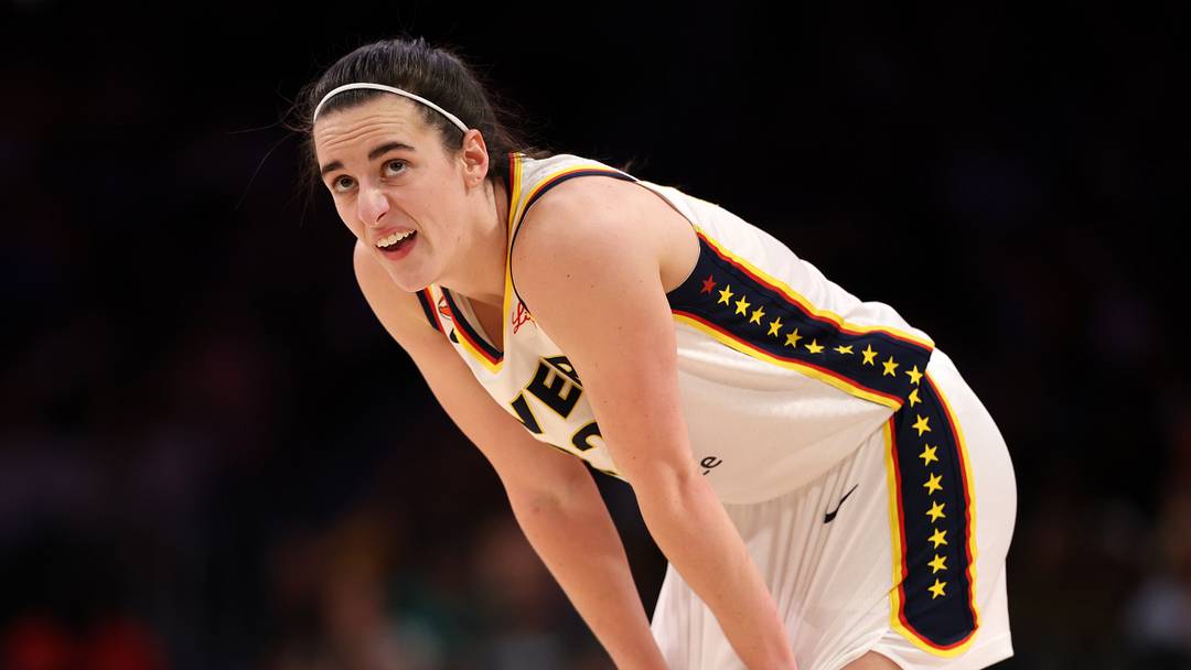 Indiana Fever guard Caitlin Clark (22) reacts to a play 