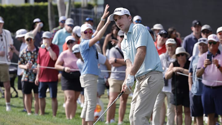 Russell Henley chips onto the tenth green during the final round of the Arnold Palmer Invitational golf tournament 