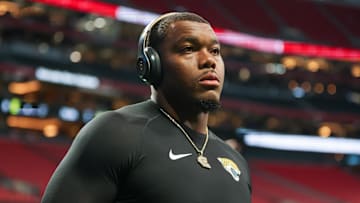 Aug 23, 2024; Atlanta, Georgia, USA; Jacksonville Jaguars defensive end Travon Walker (44) prepares for a game against the Atlanta Falcons at Mercedes-Benz Stadium. 