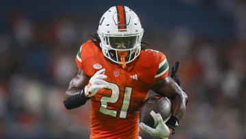 Sep 1, 2023; Miami Gardens, Florida, USA; Miami Hurricanes running back Henry Parrish Jr. (21) runs for a touchdown against the Miami Redhawks during the fourth quarter at Hard Rock Stadium. Mandatory Credit: Sam Navarro-USA TODAY Sports