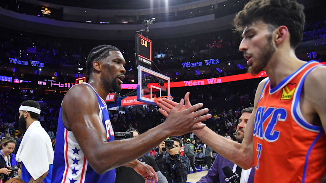 Apr 2, 2024; Philadelphia, Pennsylvania, USA; Philadelphia 76ers center Joel Embiid (21) and