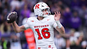 Oct 10, 2025; Seattle, Washington, USA; Rutgers Scarlet Knights quarterback Athan Kaliakmanis (16) prepares to throw the ball during the first half against the Washington Huskies at Husky Stadium. 