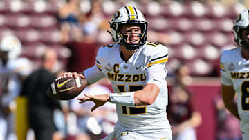 Oct 5, 2024; College Station, Texas, USA; Missouri Tigers quarterback Brady Cook (12) warms up prior to the game against the Texas A&M Aggies at Kyle Field. Mandatory Credit: Maria Lysaker-Imagn Images. 