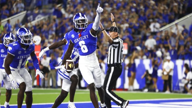 Kentucky defensive back JQ Hardaway celebrates after an interception.