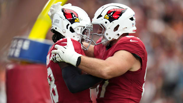 Arizona Cardinals receiver Marvin Harrison Jr. (18) celebrates his touchdown with teammate Trey McBride (85) during their gam