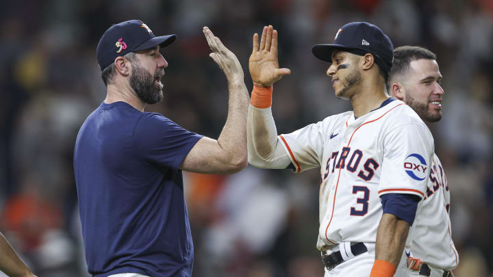 Aug 17, 2024; Houston, Texas, USA; Houston Astros pitcher Justin Verlander (left) celebrates with shortstop Jeremy Pena (3) after the game against the Chicago White Sox at Minute Maid Park.