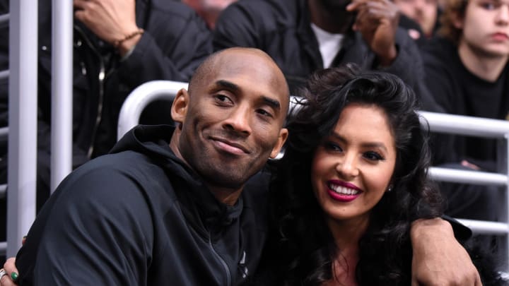 Mar 9, 2016; Los Angeles, CA, USA; Los Angeles Lakers guard Kobe Bryant (left) and wife Vanessa Bryant attend an NHL game between the Washington Capitals and the Los Angeles Kings at Staples Center. 