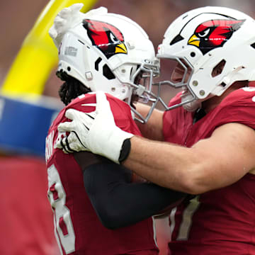 Arizona Cardinals receiver Marvin Harrison Jr. (18) celebrates his touchdown with teammate Trey McBride (85) during their game against the Los Angeles Rams on Sept. 15, 2024, at State Farm Stadium in Glendale.