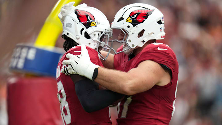 Arizona Cardinals receiver Marvin Harrison Jr. (18) celebrates his touchdown with teammate Trey McBride (85) during their game against the Los Angeles Rams on Sept. 15, 2024, at State Farm Stadium in Glendale.