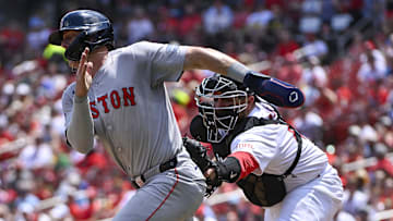 May 19, 2024; St. Louis, Missouri, USA;  St. Louis Cardinals catcher Pedro Pages (43) tags out Boston Red Sox shortstop Romy Gonzalez (23) during the fourth inning at Busch Stadium. Mandatory Credit: Jeff Curry-USA TODAY Sports