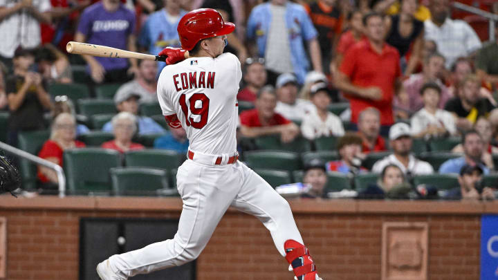 Aug 29, 2023; St. Louis, Missouri, USA;  St. Louis Cardinals pinch hitter Tommy Edman (19) hits a walk-off one run single against the San Diego Padres during the tenth inning at Busch Stadium. Mandatory Credit: Jeff Curry-USA TODAY Sports