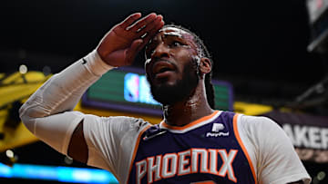 Phoenix Suns forward Jae Crowder reacts after blocking a shot against Los Angeles Lakers guard Talen Horton-Tucker during the first half at Staples Center on December 21, 2021.