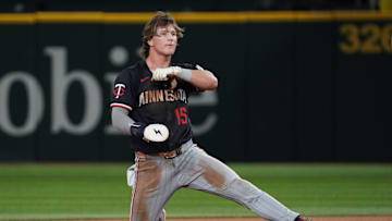 Sep 23, 2025; Arlington, Texas, USA; Minnesota Twins second baseman Luke Keaschall (15) keeps a foot on the base after stealing second during the second inning against the Texas Rangers at Globe Life Field. Mandatory Credit: Raymond Carlin III-Imagn Images