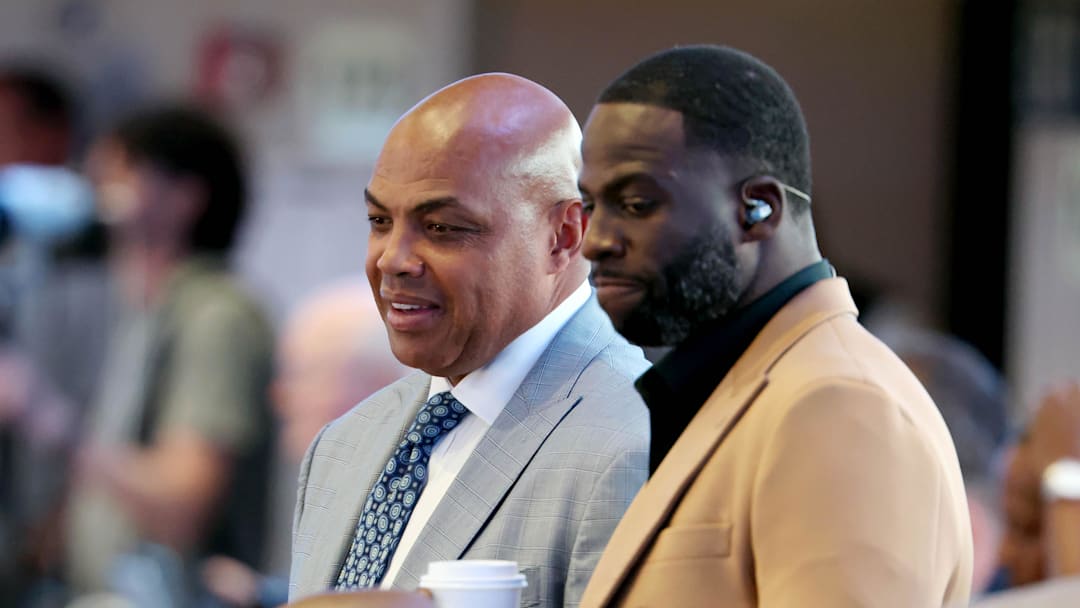 May 26, 2024; Dallas, Texas, USA; Charles Barkley (left) and Draymond Green (right) look on in the first half between the Dallas Mavericks and the Minnesota Timberwolves during game three of the western conference finals for the 2024 NBA playoffs at American Airlines Center. Mandatory Credit: Kevin Jairaj-Imagn Images