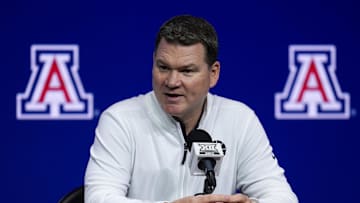Oct 23, 2024; Kansas City, MO, USA; Arizona Wildcats head coach Tommy Lloyd talks to media during the Big 12 Men’s Basketball Media Day at T-Mobile Center. Mandatory Credit: Jay Biggerstaff-Imagn Images