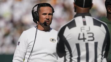 Oct 20, 2024; Green Bay, Wisconsin, USA;  Green Bay Packers head coach Matt LaFleur talks with an official during the second quarter against the Houston Texans at Lambeau Field. Mandatory Credit: Jeff Hanisch-Imagn Images