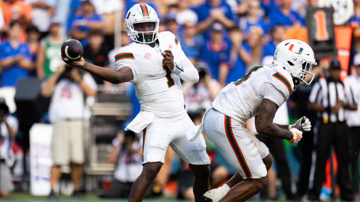 Aug 31, 2024; Gainesville, Florida, USA;  Miami Hurricanes quarterback Cam Ward (1) throws the ball against the Florida Gators during the second half at Ben Hill Griffin Stadium. Mandatory Credit: Matt Pendleton-USA TODAY Sports