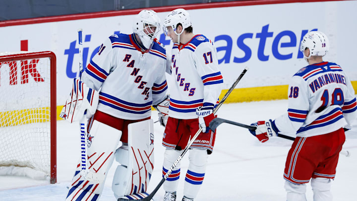 Mar 12, 2026; Winnipeg, Manitoba, CAN; New York Rangers goalie Igor Shesterkin (31) is congratulated by defenseman Will Borgen (17) on his win against the Winnipeg Jets at the end of the third period at Canada Life Centre. 