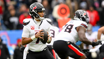Jan 5, 2025; Nashville, Tennessee, USA;  Houston Texans quarterback C.J. Stroud (7) stands in the pocket against the Tennessee Titans during the first half at Nissan Stadium. Mandatory Credit: Steve Roberts-Imagn Images