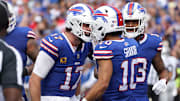 Bills quarterback Josh Allen congratulates receiver Khalil Shakir on his touchdown catch.