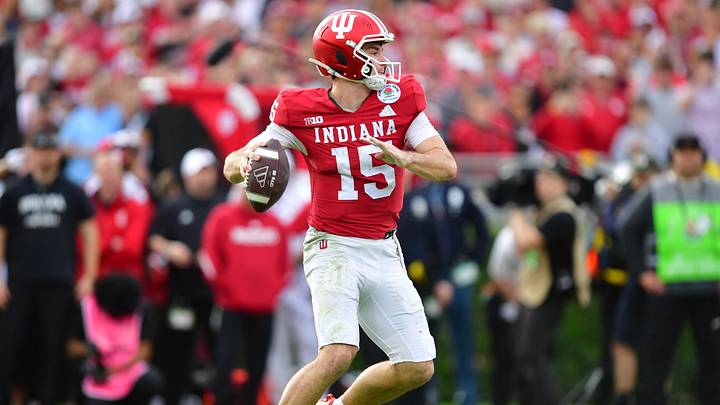 Jan 1, 2026; Pasadena, CA, USA; Indiana Hoosiers quarterback Fernando Mendoza (15) throws a pass for a touchdown against the Alabama Crimson Tide in the first half of the 2026 Rose Bowl and quarterfinal game of the College Football Playoff at Rose Bowl Stadium. Mandatory Credit: Gary A. Vasquez-Imagn Images