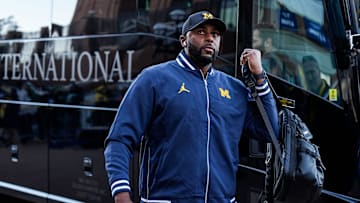 Michigan head coach Sherrone Moore walks off the bus during team arrival before the Michigan State game at Michigan Stadium in Ann Arbor on Saturday, Oct. 26, 2024.