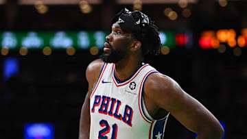 Dec 25, 2024; Boston, Massachusetts, USA; Philadelphia 76ers center Joel Embiid (21) waits during a timeout during the second half against the Boston Celtics at TD Garden. Mandatory Credit: Eric Canha-Imagn Images
