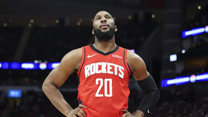Apr 12, 2026; Houston, Texas, USA; Houston Rockets guard Josh Okogie (20) reacts after a play during the second quarter against the Memphis Grizzlies at Toyota Center. Mandatory Credit: Troy Taormina-Imagn Images