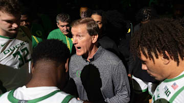 Oregon men's basketball coach Dana Altman talks to his team before their game against Troy at Matthew Knight Arena in Eugene on Sunday, Nov. 17, 2024.