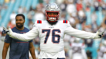 Jan 9, 2022; Miami Gardens, Florida, USA; New England Patriots offensive tackle Isaiah Wynn (76) reacts from the field prior to the game against the Miami Dolphins at Hard Rock Stadium. Mandatory Credit: Sam Navarro-Imagn Images