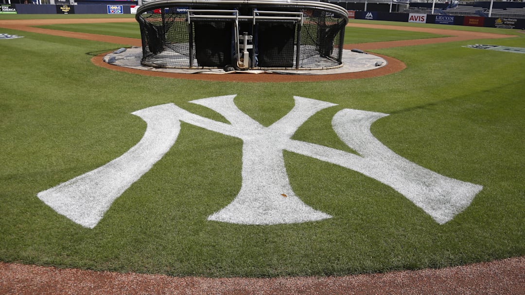 Feb 22, 2017; Tampa, FL, USA; The New York Yankees logo is painted on the field during a rain shortened  MLB spring training workouts at George M. Steinbrenner Field. Mandatory Credit: Reinhold Matay-Imagn Images