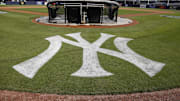 Feb 22, 2017; Tampa, FL, USA; The New York Yankees logo is painted on the field during a rain shortened  MLB spring training workouts at George M. Steinbrenner Field. Mandatory Credit: Reinhold Matay-Imagn Images