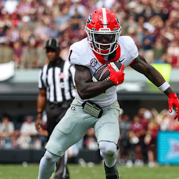 Nov 8, 2025; Starkville, Mississippi, USA; Georgia Bulldogs wide receiver Zachariah Branch (1) runs for a touchdown against the Mississippi State Bulldogs during the first half at Davis Wade Stadium at Scott Field. Mandatory Credit: Wesley Hale-Imagn Images
