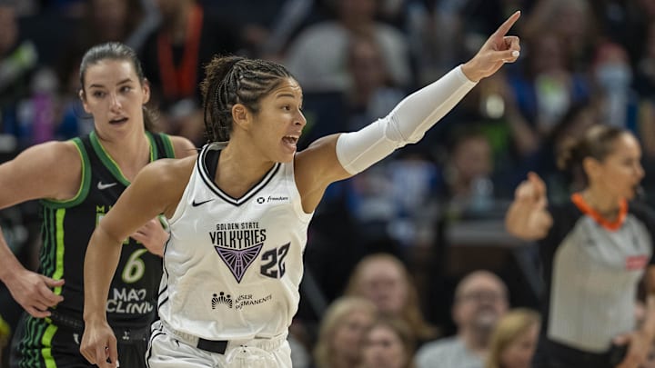 Golden State Valkyries guard Veronica Burton (22) celebrates after making a three point shot against the Minnesota Lynx in the first half during game one of round one for the 2025 WNBA Playoffs at Target Center.