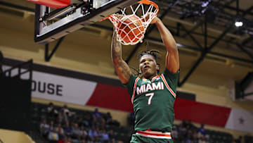 Nov 28, 2025; Kissimmee, FL, USA; Miami (FL) Hurricanes forward Shelton Henderson (7) dunks the ball against the Georgetown Hoyas in the second half during the ESPN Events Invitational at State Farm Field House. Mandatory Credit: Nathan Ray Seebeck-Imagn Images