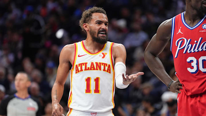Trae Young (11) reacts against the Philadelphia 76ers in the third quarter at Wells Fargo Center.