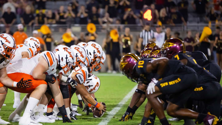 Sep 9, 2023; Tempe, Arizona, USA; General view down the line of scrimmage as Oklahoma State Cowboys long snapper Zeke Zaragoza (63) prepares to snap the ball against the Arizona State Sun Devils at Mountain America Stadium. Mandatory Credit: Mark J. Rebilas-USA TODAY Sports