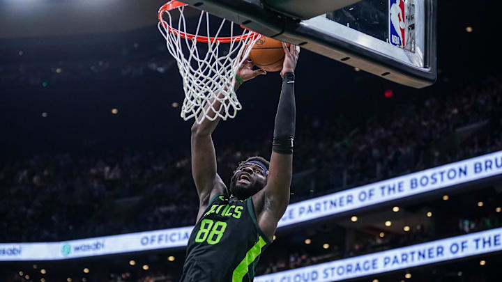 Mar 6, 2025; Boston, Massachusetts, USA; Boston Celtics center Neemias Queta (88) makes the basket against the Philadelphia 76ers in the second half at TD Garden. Mandatory Credit: David Butler II-Imagn Images