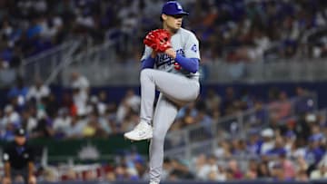 Sep 18, 2024; Miami, Florida, USA; Los Angeles Dodgers relief pitcher Joe Kelly (99) delivers a pitch against the Miami Marlins during the sixth inning at loanDepot Park. Mandatory Credit: Sam Navarro-Imagn Images