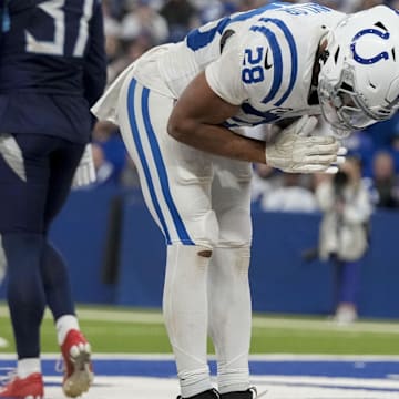 Dec 22, 2024; Indianapolis, Indiana, USA; Indianapolis Colts running back Jonathan Taylor (28) celebrates after rushing for a touchdown during a game against the Tennessee Titans at Lucas Oil Stadium. Mandatory Credit: Grace Hollars/USA Today Network via Imagn Images 