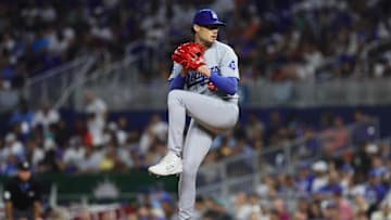 Sep 18, 2024; Miami, Florida, USA; Los Angeles Dodgers relief pitcher Joe Kelly (99) delivers a pitch against the Miami Marlins during the sixth inning at loanDepot Park. Mandatory Credit: Sam Navarro-Imagn Images