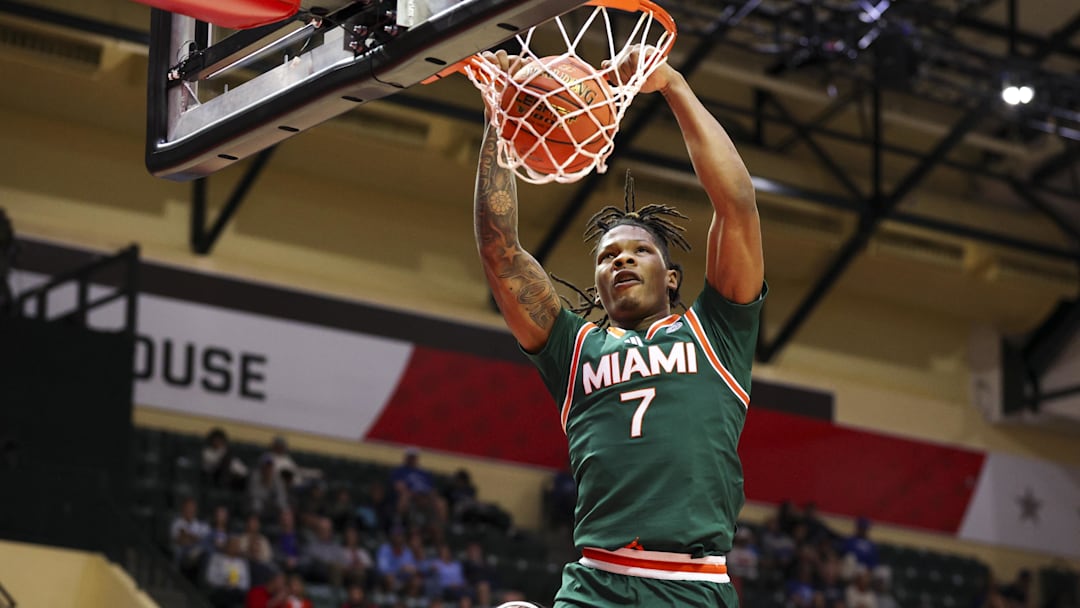 Nov 28, 2025; Kissimmee, FL, USA; Miami (FL) Hurricanes forward Shelton Henderson (7) dunks the ball against the Georgetown Hoyas in the second half during the ESPN Events Invitational at State Farm Field House. Mandatory Credit: Nathan Ray Seebeck-Imagn Images