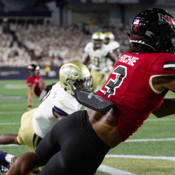 Sep 4, 2021; Atlanta, Georgia, USA; Northern Illinois Huskies wide receiver Tyrice Richie (3) catches a pass for a touchdown against the Georgia Tech Yellow Jackets in the second half at Bobby Dodd Stadium.